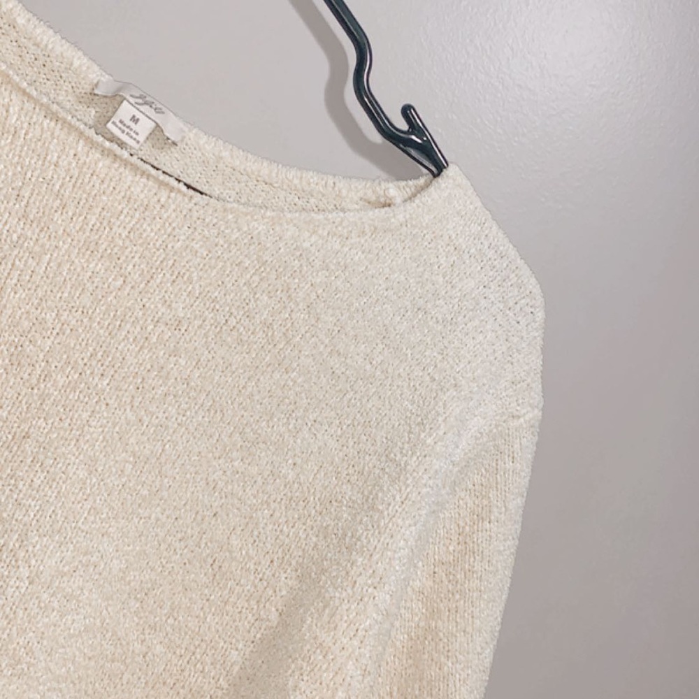 yellow sweater